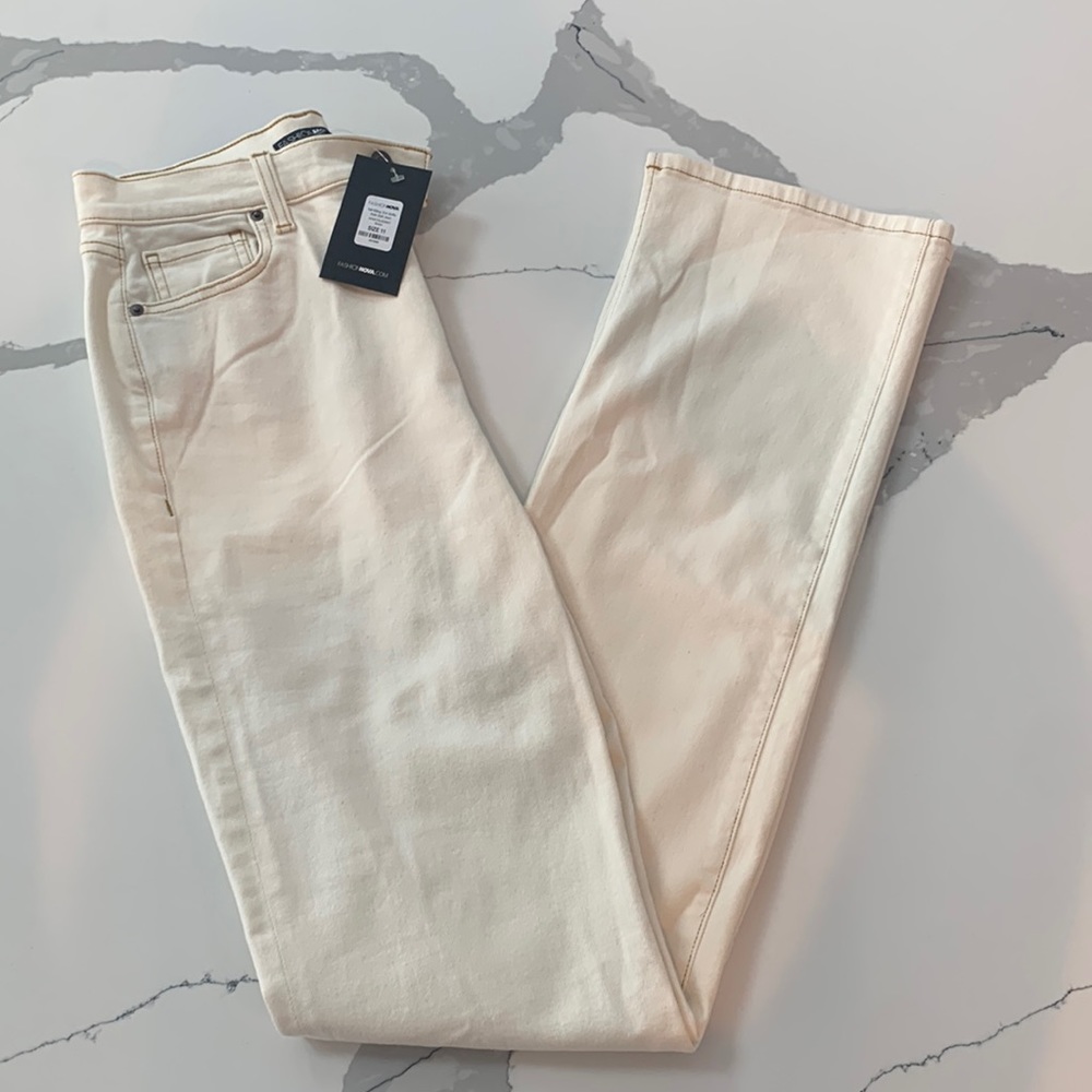 Split hem cream pants. Bootcut and high-waisted. Size 11. Long length.